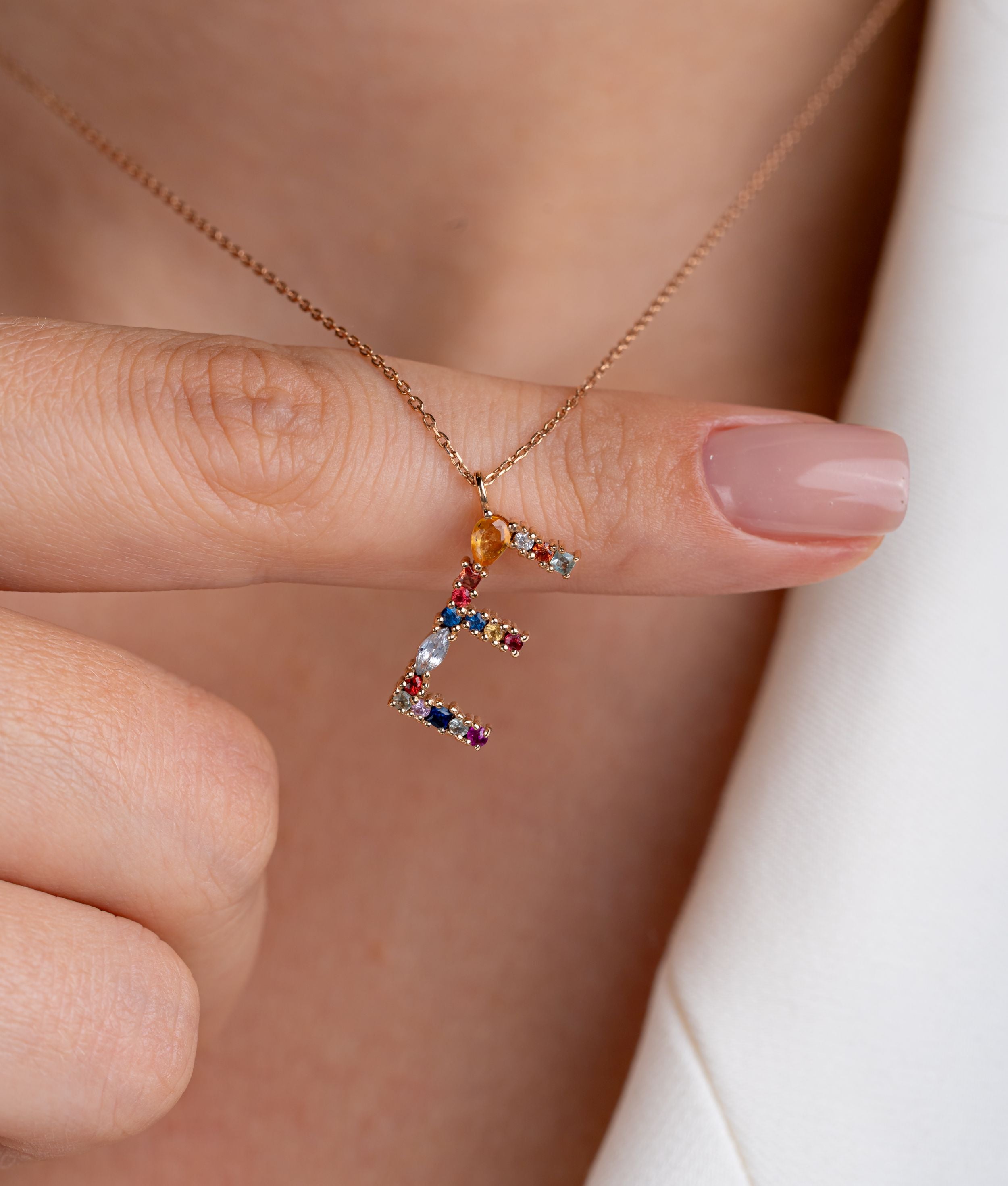 Colier initiala E din aur roz 14k cu safire multicolore 0.51ct